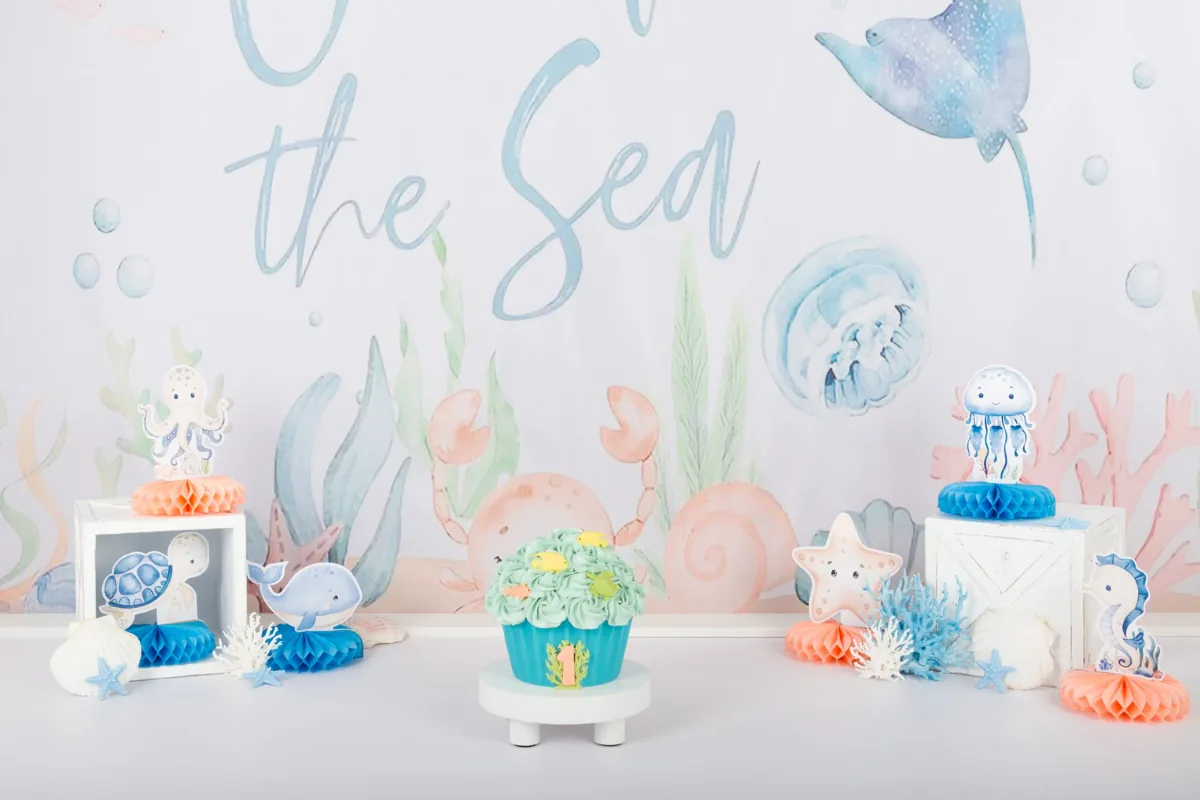 Pastel Under the Sea cake smash decor met kwal, zeepaardje en schelpen, cakesmash fotoshoot Zoetermeer