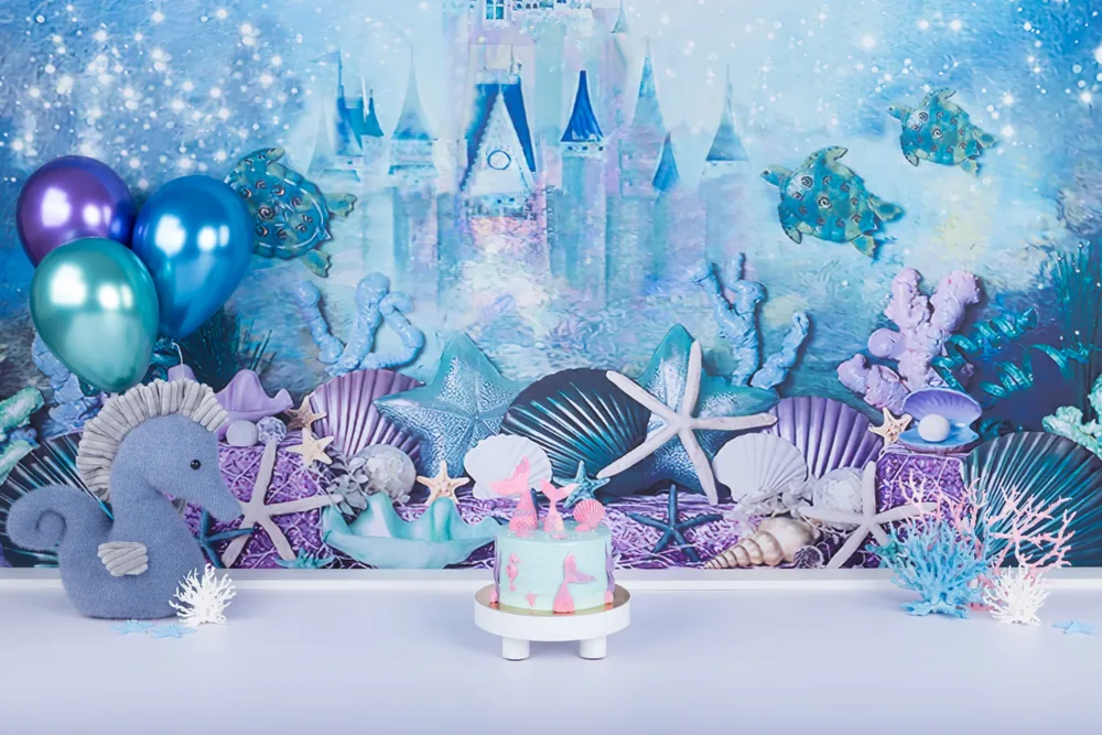 Zeemeermin cake smash decor met schelpen, zeesterren, koraal en een knuffelzeepaardje voor een onderwaterkasteel, Zoetermeer
